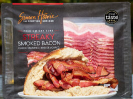Simon Howie secures hat trick at Great Taste Awards A packet of Simon Howie Smoked Streaky Bacon stands behind a bread roll filled with cooked strips of the bacon with a Three Star Great Taste Award on the packet of bacon.