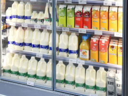 Food and drink inflation projected to reach a new high A store chiller filled with milk drink products, fruit juices and milk alternative options.
