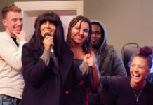 Celebrity Traitors host Claudia Winkleman fronts National Lottery campaign TV host Claudia Winkleman stands with a group of young people holding a microphone in a recording studio.