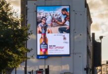 Estrella Galicia launches UK campaign and new format to build on growth An electronic billboard on the side of a building has the winter 2025 campaign for Estrella Galicia on it.