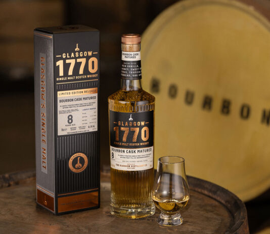 Glasgow 1770 whisky unveils Bourbon Cask Single Malt to core range A bottle of Glasgow 1770 Bourbon Cask Matured Single Malt stands on whisky barrel with the outer packaging next to it and a nosing glass with the whisky inside on its other side. There is also a barrel in the background labelled as Bourbon.
