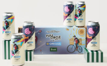 Cans of Greggs beer are stacked around the box the brews come packaged in including the Pink Jammie Pink Ale and the Gosforth 1939 Stottie Lager.
