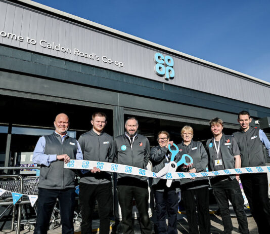 Irvine Co-op reopens its doors following refit Staff at the Co-op Caldon Road Store stand in front of the shop with a novelty pair of scissors and ribbon to mark the completion of its refit.