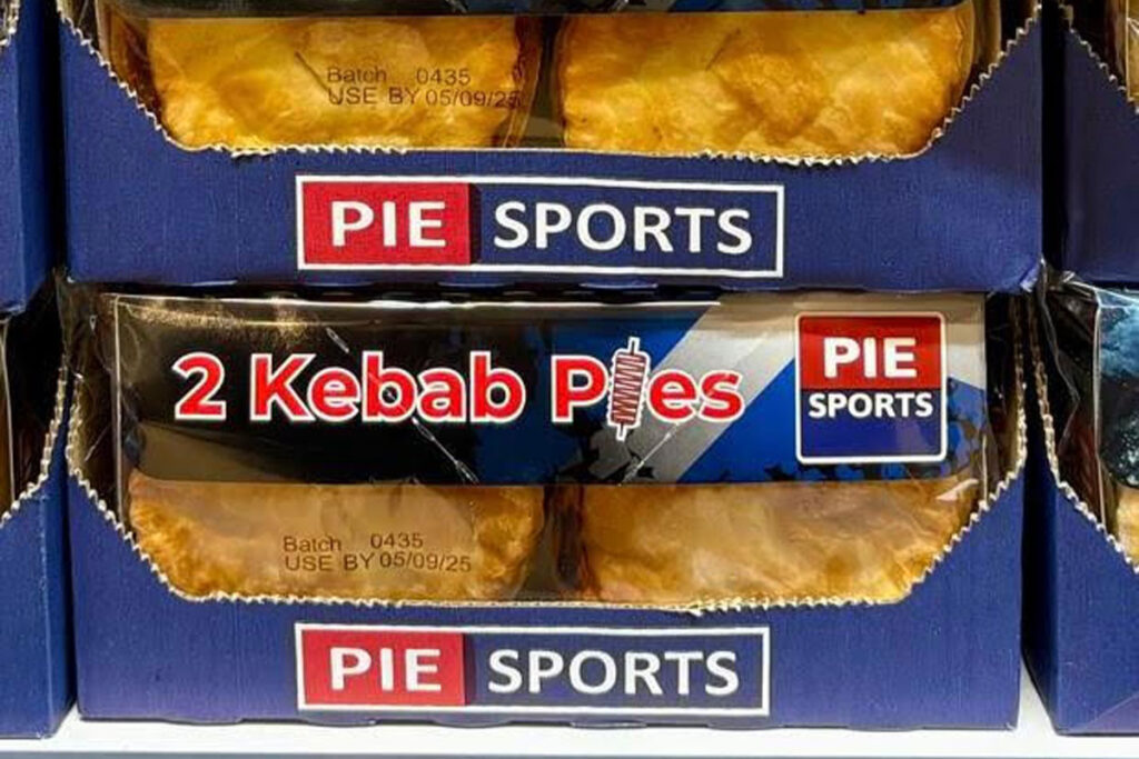Shelves of Pie Sports' Kebab Pies inside a store.