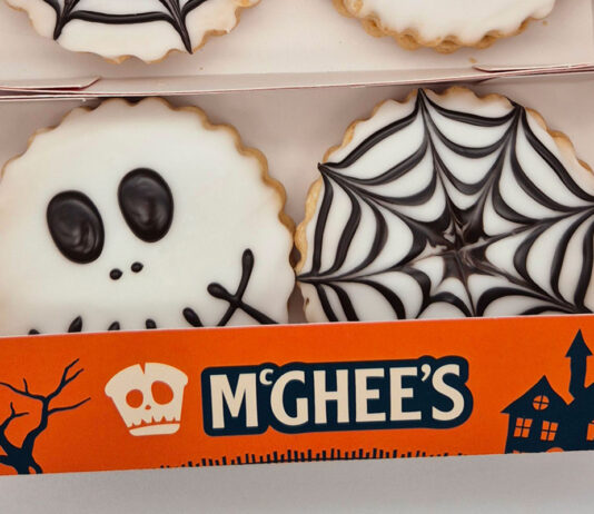 McGhee’s brings a spooky touch to its Empire Biscuits with a new Halloween design Pack shot of McGhee's Halloween Empire Biscuits with skull and spiderweb designs on them.
