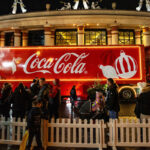 Coca-Cola Christmas truck tour kicks off along with festive fundraising focus The Coca-Cola branded Christmas truck is parked up in London with a queue of people around it to visit the staple of the season.