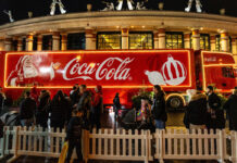 Coca-Cola Christmas truck tour kicks off along with festive fundraising focus The Coca-Cola branded Christmas truck is parked up in London with a queue of people around it to visit the staple of the season.