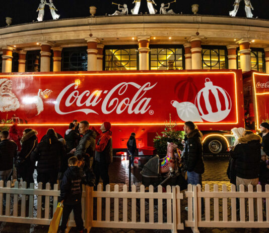 Coca-Cola Christmas truck tour kicks off along with festive fundraising focus The Coca-Cola branded Christmas truck is parked up in London with a queue of people around it to visit the staple of the season.