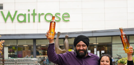 Desi Daru vodka makes its Waitrose debut with Mango Vodka variant Desi Daru founders Mohit Singh and Aneet Kaur stand outside a Waitrose store holding bottles of Desi Daru Mango Vodka.
