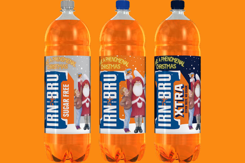 Pack shots of Irn-Bru, Irn-Bru Sugar Free and Irn-Bru XTRA with the 2025 Christmas design against an orange background.