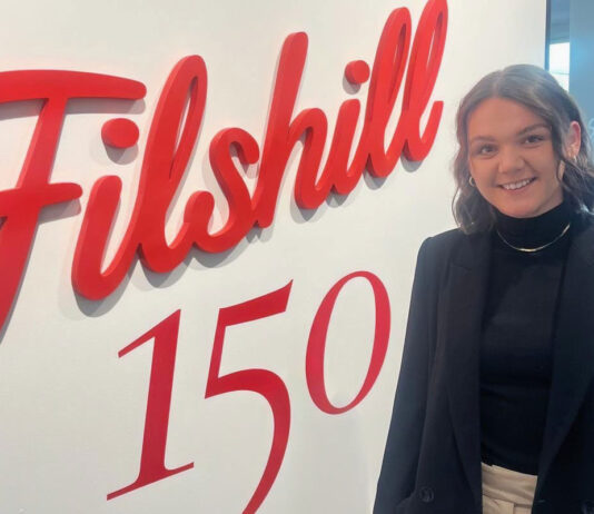 Katie Dempster takes on marketing manager role at Filshill Katie Dempster, marketing manager at Filshill, stands in front of the Filshill 150 logo at the firm's offices.