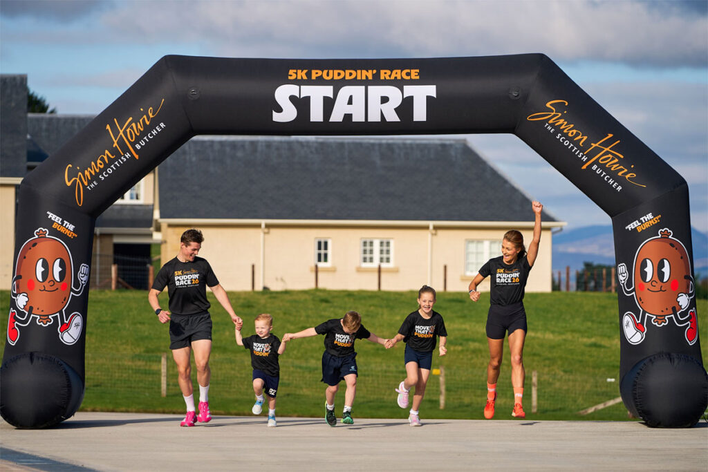 A family line up at the start of the Simon Howie Puddin Race ready to take part in the fundraiser.