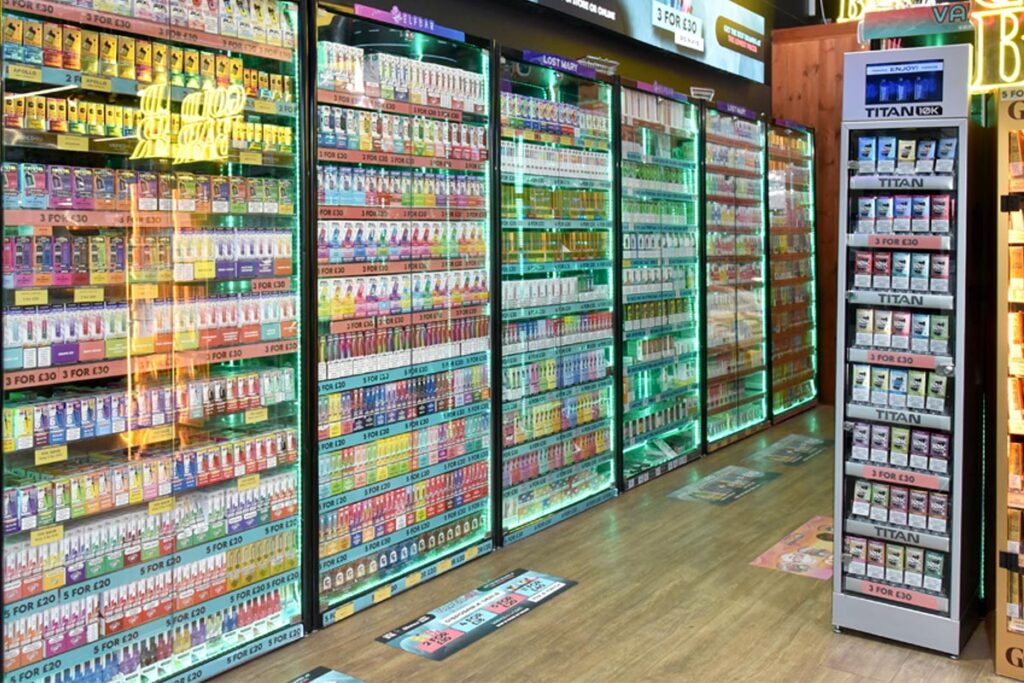 Cabinets in a shop with vaping products in them.