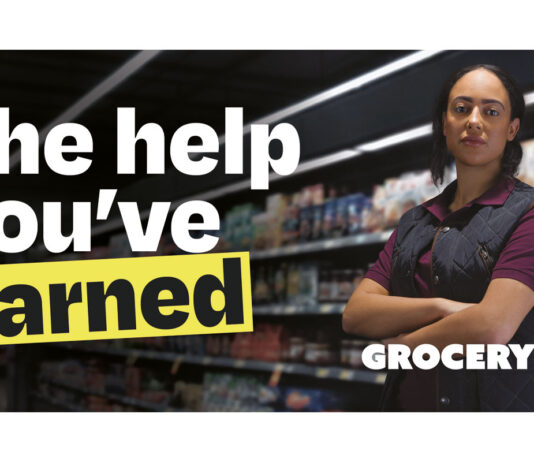 GroceryAid unveils its biggest brand refresh in 168 years A woman stands with her arms folded in the middle of a shop with the GroceryAid logo in front of her. The text to the left reads "The help you've earned".
