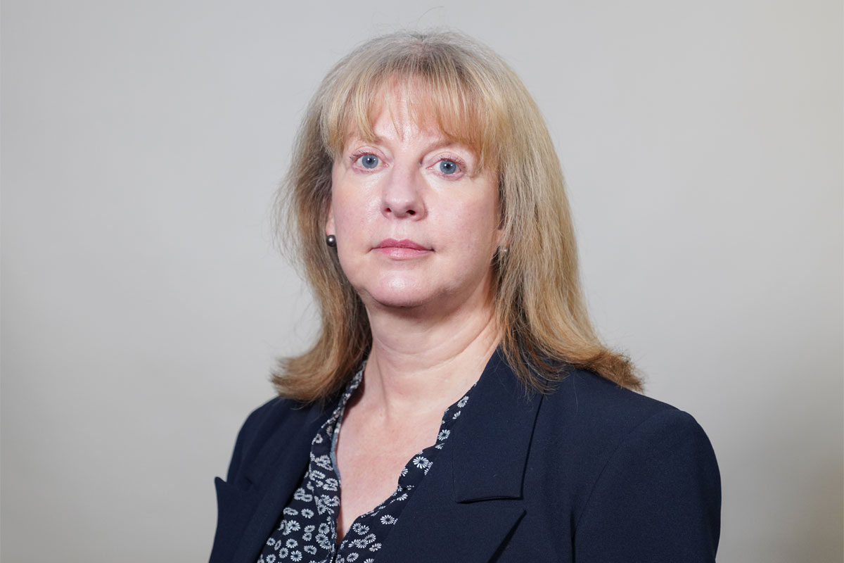 Headshot of Shona Robison, finance secretary for Scotland, against a grey background.