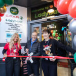 Spar Market Ladybank opens its doors following major investment A group of people stand at the entrance to Spar Market Ladybank whilst cutting a ribbon with a novelty pair of scissors.