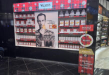 Walker’s Shortbread unveils travel retail campaign for Christmas The Walker's Shortbread travel retail display in an airport's duty free section.