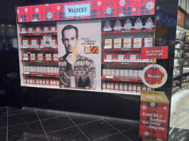 Walker’s Shortbread unveils travel retail campaign for Christmas The Walker's Shortbread travel retail display in an airport's duty free section.