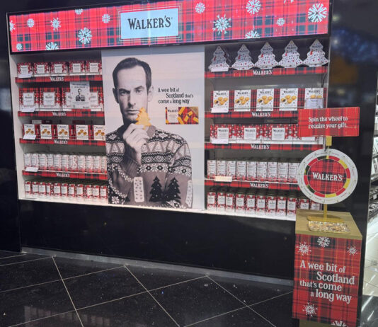 Walker’s Shortbread unveils travel retail campaign for Christmas The Walker's Shortbread travel retail display in an airport's duty free section.