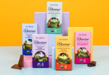 Divine Chocolate unveils refreshed new look Bars of Divine Chocolate with the 2026 redesign are stacked against boxes to showcase the new looks. There are pieces of chocolate next to the bars and the background is an orange colour with a blue foreground.