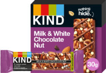 Kind launches first Milk & White Chocolate Nut bar A pack of Kind Milk & White Chocolate Nut Bar stands in the background with a single bar of it in front of the pack.