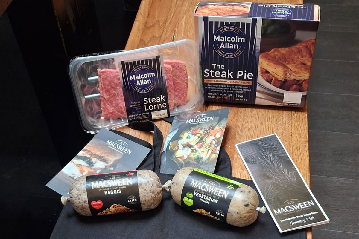 Packs of Malcolm Allan Steak Lorne and Steak Pie and Macsween Haggis and Vegetarian Haggis sit on a table.