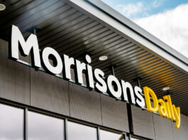 Building loyalty across Morrisons Daily stores Morrisons Daily logo hanging from the roof of the convenience store.