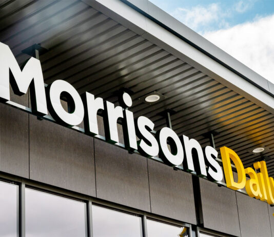 Building loyalty across Morrisons Daily stores Morrisons Daily logo hanging from the roof of the convenience store.