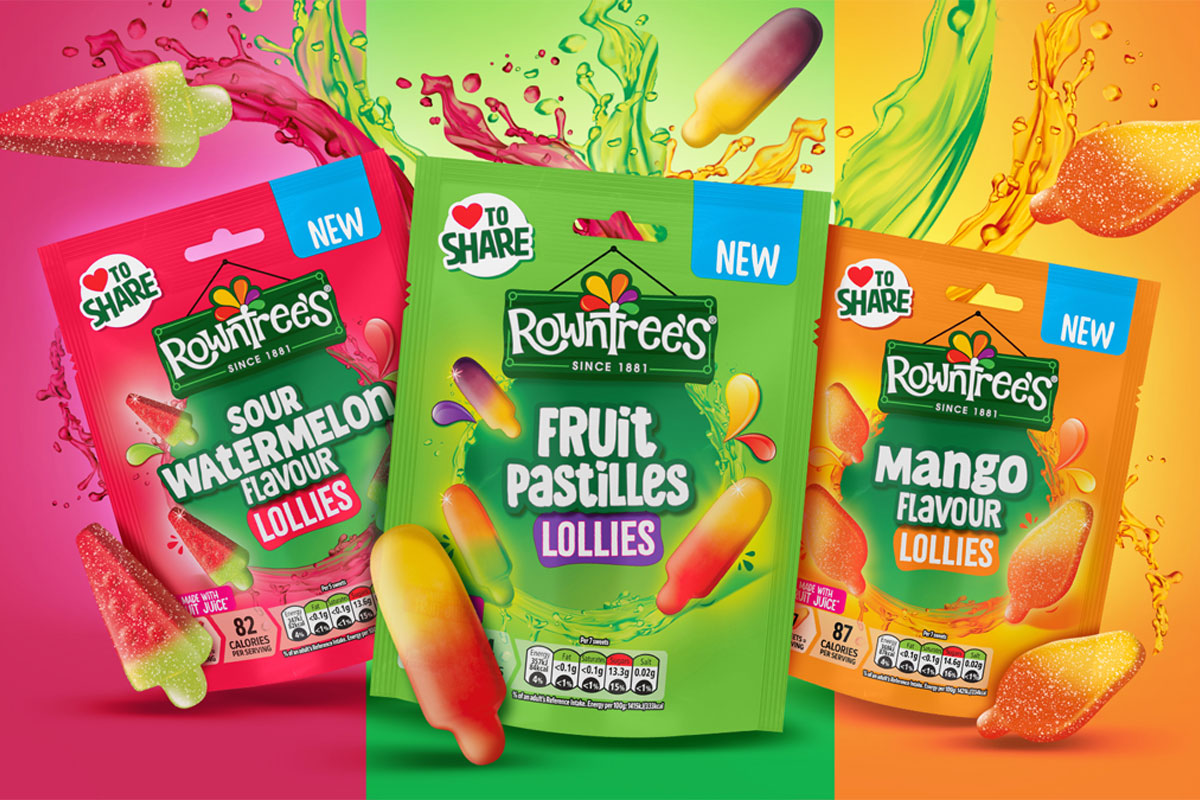Packs of Rowntree's Sour Watermelon Lollies, Fruit Pastille Lollies and Mango Lollies are lined up with the sweets bursting out of the bags with swishes of the juices. Each pack is against a representative colour ranging from pink, green and orange.