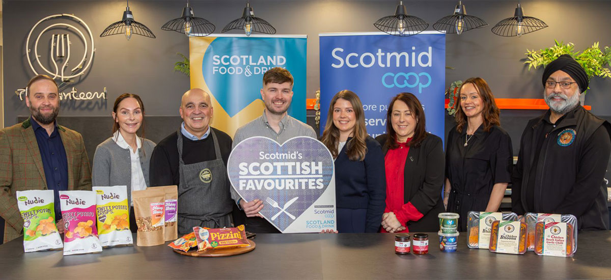 A group of people stand together to mark the winners of the Scotmid Scottish Favourites competition for 2026.