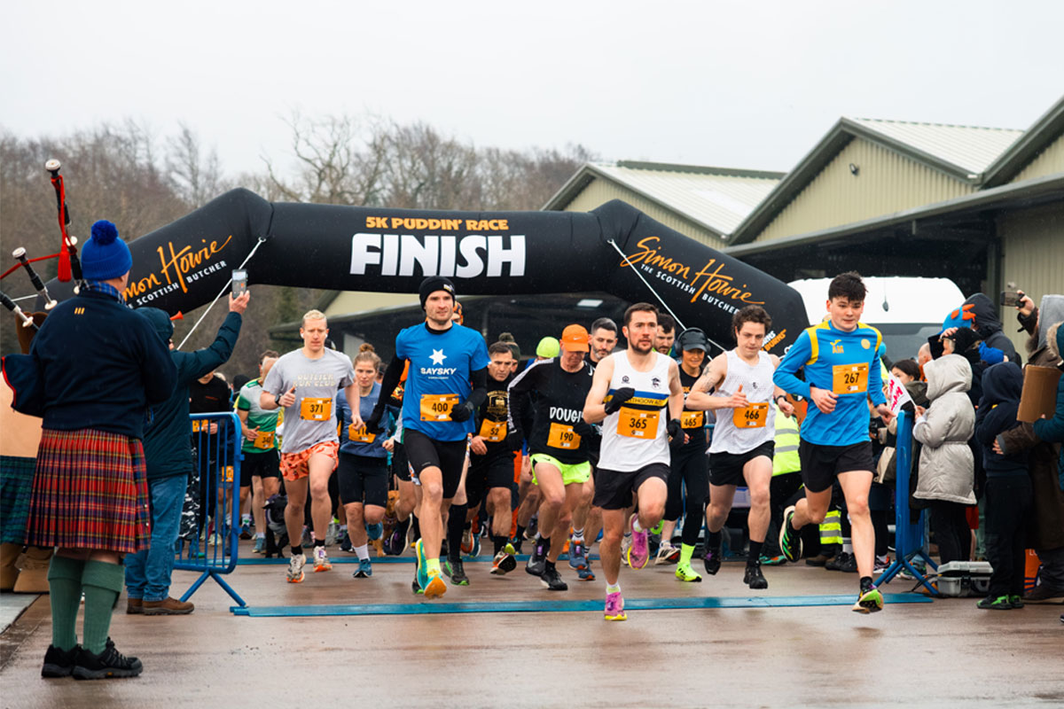 A group of people taking part in the Simon Howie Puddin Race 5k run on Burns Night.