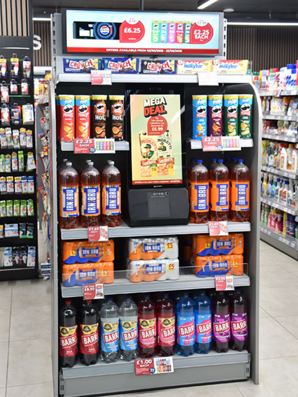 A store shelf in Day-Today Anniesland displaying its Spin to Win mechanic.