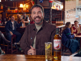 The Famous Grouse flies with Martin Compston in new campaign Martin Compston stands in a pub with a bottle of The Famous Grouse and a cocktail serve next to it.