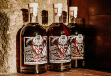 Hive Mind launches Dark Cherry Mead for young adults Bottles of Hive Mind Dark Cherry Mead are lined up against a wall.