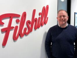 Matthew Howie joins JW Filshill Matthew Howie, business development manager at JW Filshill, stands next to the Filshill logo at the business' offices.