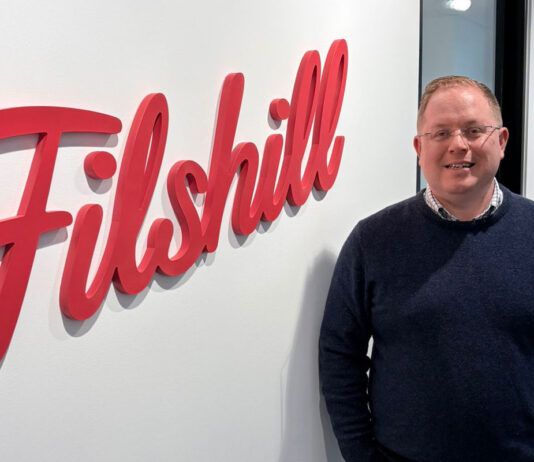 Matthew Howie joins JW Filshill Matthew Howie, business development manager at JW Filshill, stands next to the Filshill logo at the business' offices.