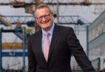 Spar Scotland appoints new chair An image of Eoin McGhettigan standing at a dock.