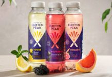 Nestlé unveils new Buxton functional water range Bottles of Inspired by Buxton Focus, Recharge and Immuno stand together with pieces of fruit around the three.