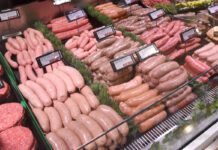 Food and drink sector builds on economic growth A butchery counter featuring a range of meat products including burgers and sausages.