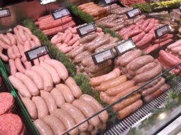 Food and drink sector builds on economic growth A butchery counter featuring a range of meat products including burgers and sausages.