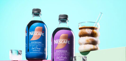 Nescafé expands Espresso Concentrated range with Mocha and Decaf Bottles of Nescafé Espresso Concentrated Mocha and Decaf variants are stacked up on pastel coloured boxes with an iced coffee serve next to them.