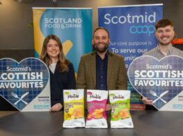 Nudie Snacks crisps range hits Scotmid shelves Lauren Rafferty, commercial development coordinator at Scotmid, Rodney Graham, managing director at Nudie Snacks and Steve Addison, local sourcing manager at Scotmid, all stand at a table for the Scottish Favourites competition with packs of Nudie Snacks sweet potato crisps.