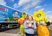 Spar kicks off new ‘Spin into Spring’ activation A group of Spar team members stand in front of a Spar lorry with livery for the Spin into Spring activation across it.