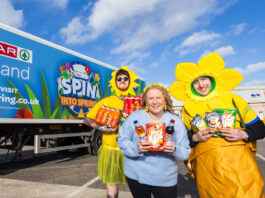 Spar kicks off new ‘Spin into Spring’ activation A group of Spar team members stand in front of a Spar lorry with livery for the Spin into Spring activation across it.