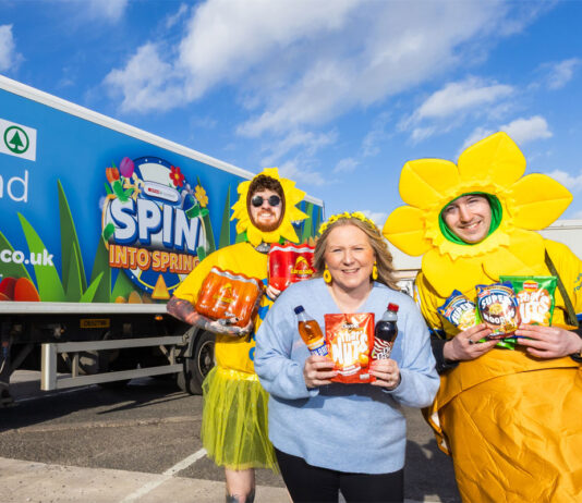 Spar kicks off new ‘Spin into Spring’ activation A group of Spar team members stand in front of a Spar lorry with livery for the Spin into Spring activation across it.