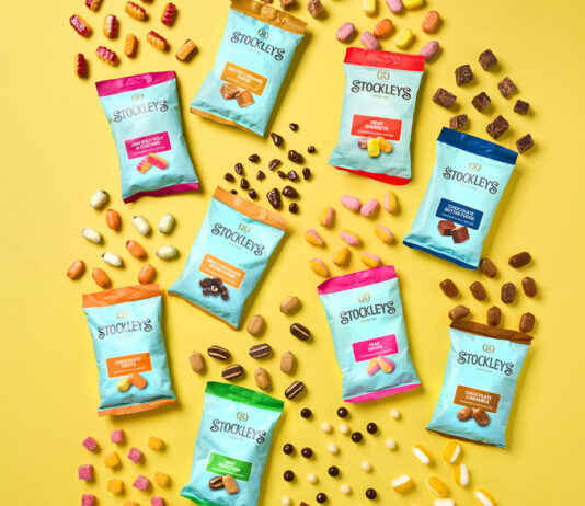 Stockley’s rolls out new Treat Bag format Bags of Stockleys sweets with sweets pouring out from them against a yellow background.