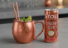 Stoli relaunches Ginger Beer cans A can of Stoli Ginger Beer stands next to a copper mug with the Stoli logo on it.
