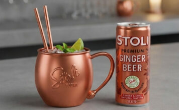 Stoli relaunches Ginger Beer cans A can of Stoli Ginger Beer stands next to a copper mug with the Stoli logo on it.