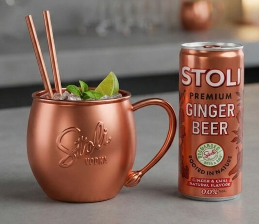 Stoli relaunches Ginger Beer cans A can of Stoli Ginger Beer stands next to a copper mug with the Stoli logo on it.
