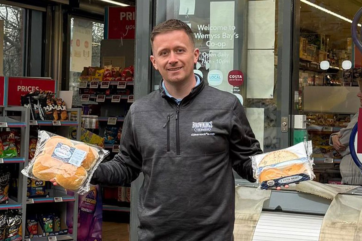 Fraser Gall, sales director at Brownings the Bakers, stands outside the Weymss Bay Co-op store holding Brownings products.